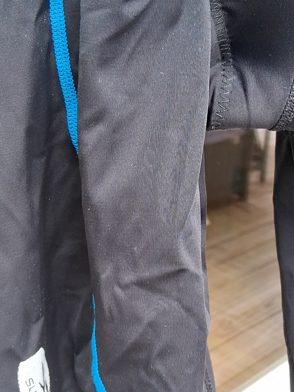 SUGOI Black and Gray with Blue Trim Sleeveless Tri Suit - Picture 4 of 5